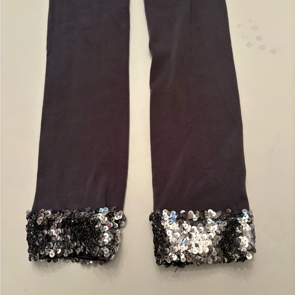 Chic Black Leggings with Sparkling Hem